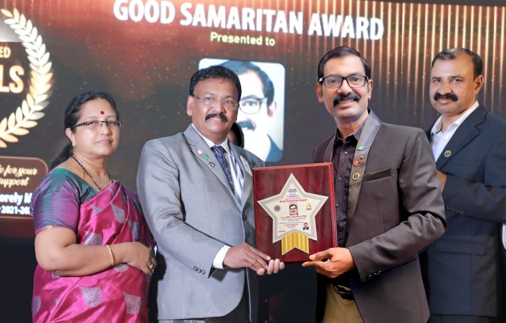Photo of Lion James Valappila PMJF receiving the Lions Good Samaritan Award.Lions club project,
Lions Club India, Lions Club International, Lion Club Kerala.Featured by www.jamesvalappila.com and authored by Lion James Valappila PMJF