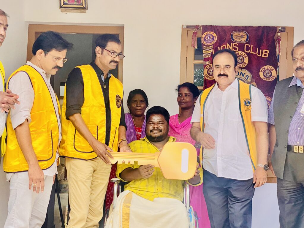 Photo of Key handover of home was done through Lions Home for Homeless Project by Lions Club of Trichur,Lions club project,
Lions Club India, Lions Club International, Lion Club Kerala.Featured by www.jamesvalappila.com and authored by Lion James Valappila PMJF
