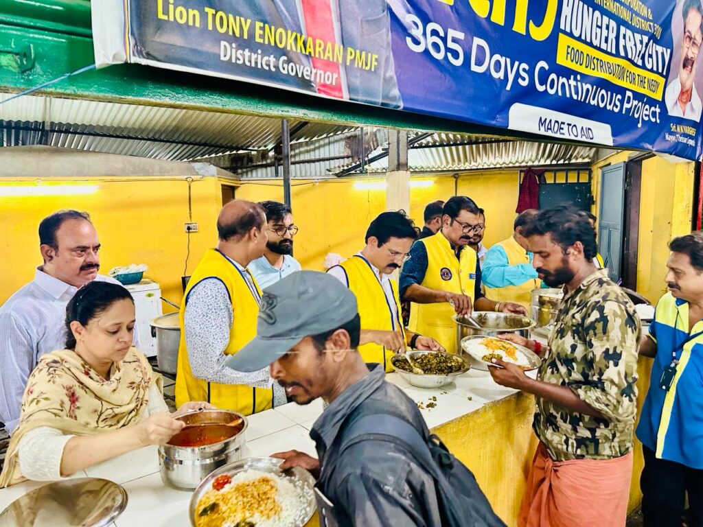 Photo of Lions Manna Hunger Free City Food Distribution.Lions Club of Thrichur orchestrates Manna Hunger Free City day for distributing food to the needy, guided by Lion James Valappila PMJF District 318D. With Lions Hunger Project initiatives, they continue their steadfast fight against hunger, advancing their mission in Kerala communities.Lion Club Kerala.Featured by www.jamesvalappila.com and authored by Lion James Valappila PMJF