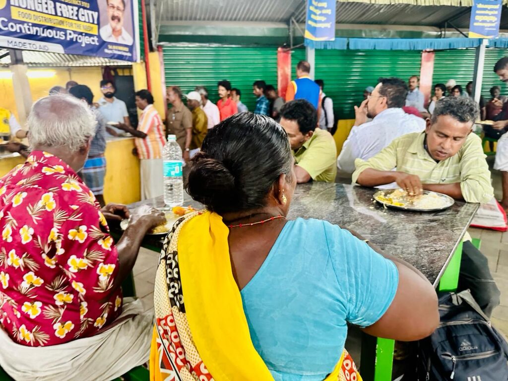 Photo of Lions Manna Hunger Free City Food Distribution.Lions Club of Thrichur orchestrates Manna Hunger Free City day for distributing food to the needy, guided by Lion James Valappila PMJF District 318D. With Lions Hunger Project initiatives, they continue their steadfast fight against hunger, advancing their mission in Kerala communities.Lion Club Kerala.Featured by www.jamesvalappila.com and authored by Lion James Valappila PMJF