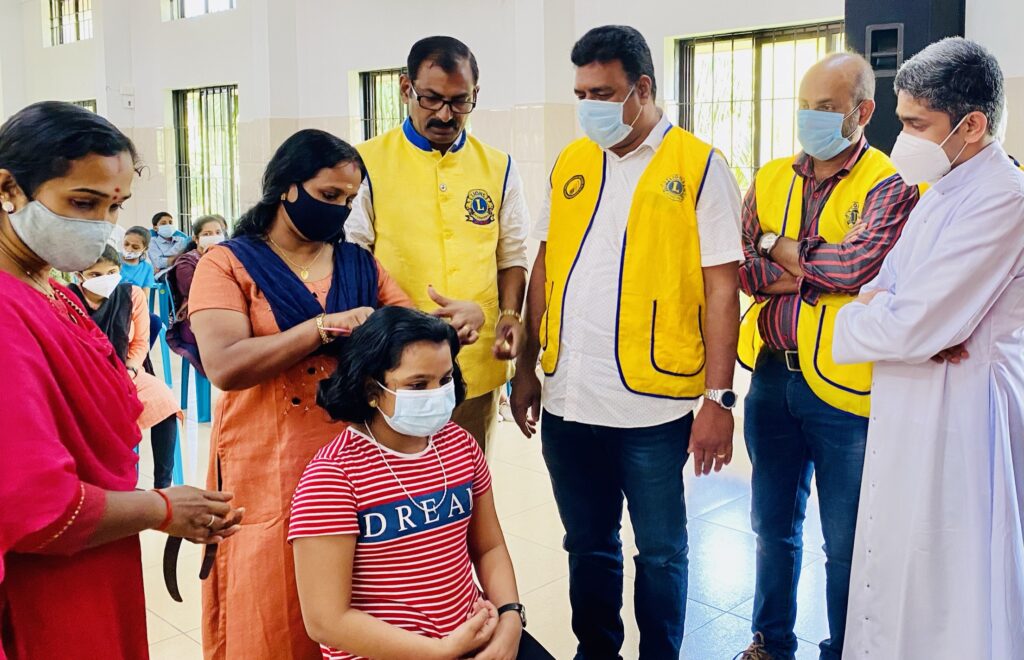 Image of Lions Club of Mannuthy Agri City, under Governor Lion James Valappila PMJF District 318D's leadership, champions the Hair Donation Lions Club Project, symbolizing solidarity. Their dedication, aligned with Lions Club India and Lions Club Kerala, extends support to those in need, echoing the compassionate spirit of Lions Club Activities Project and Lions Childhood Cancer Project.Lions Club of Mannuthy Agri City, under Governor Lion James Valappila PMJF District 318D's leadership, champions the Hair Donation Lions Club Project, symbolizing solidarity. Their dedication, aligned with Lions Club India and Lions Club Kerala, extends support to those in need, echoing the compassionate spirit of Lions Club Activities Project and Lions Childhood Cancer Project.Lion Club Kerala.Featured by www.jamesvalappila.com and authored by Lion James Valappila PMJF. Lions District 318d Club International, Lions District 318d Club Kerala, Lions District 318d Club Activities, Lions District 318d, Lions Club India.