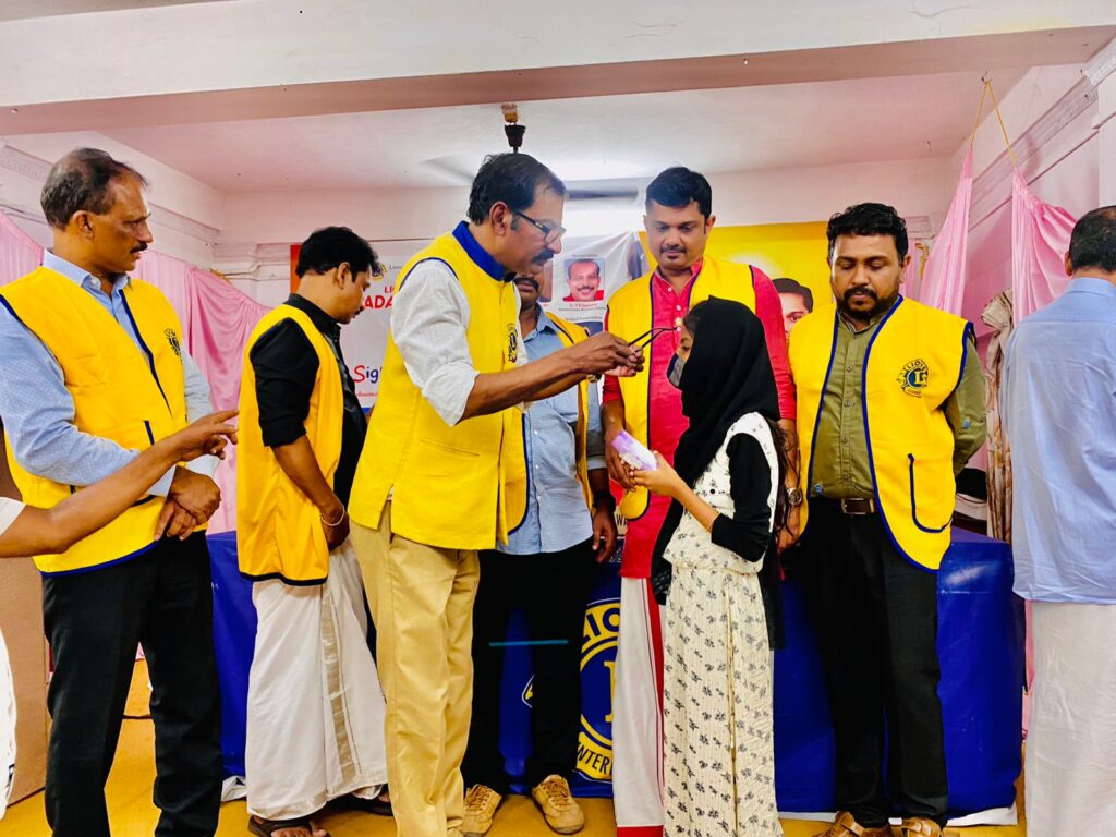 Image of Spectacle distribution event by Lions Sight for Kids at Wadakkanchery Cochin, under Lions Club's Vision Projects,by Lions Club of Wadakkanchery Cochin District 318D, brings clarity to young eyes. This Lions Vision Club Project offers essential eyewear, empowering children for brighter futures through improved vision.Lion Club Kerala.Featured by www.jamesvalappila.com and authored by Lion James Valappila PMJF