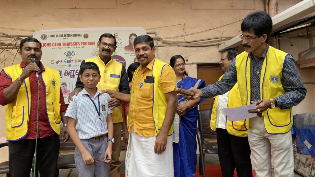 Image of The Lions Club of Palaghat conducted the Lions Service Project, distributing lottery stands and bags, guided by Lion James Valappila PMJF, District 318D, fostering community support and engagement.. The Lions Thrissur Pooram conducted the Sight For Kids project and spectacle distribution as part of the Lions Vision Project, guided by Lion James Valappila PMJF, District 318D, enhancing children's eye health and vision. Lions Club Project ,District 318d,Lions District 318d,
Lions Club India
Lions Club India,
Lions Club Kerala,
Lions Club Activities Project,Lions Childhood Cancer Project,
Lions Club Environment Project,
Lions Vision ProjectLions Vision Projects
Vision Project Lions
Vision Projects Lions Club
Lions Club Vision Project
Vision Projects
Vision Project District 318d
Lions Vision Club Project
Vision Project of Lions
Lions Vision Project District 318d
Vision Lions Project Lion Club Kerala.Featured by www.jamesvalappila.com and authored by Lion James Valappila PMJF