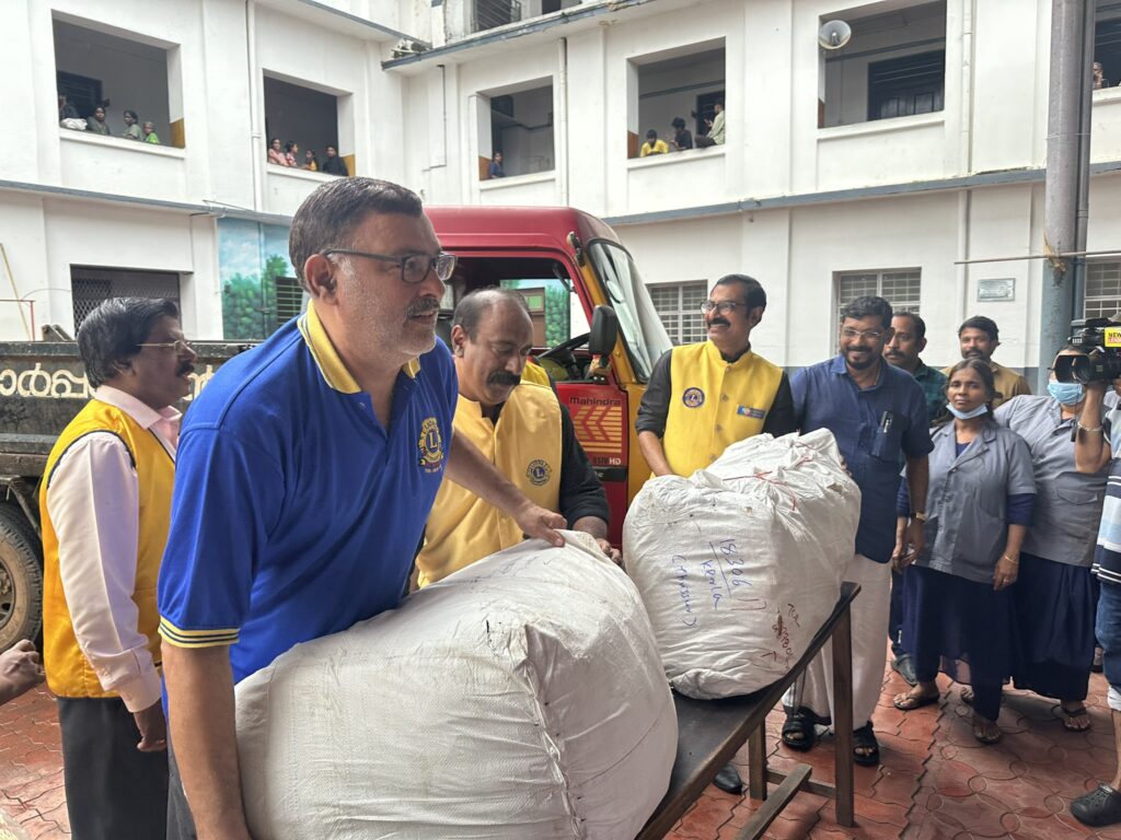Image of The Lions Club Service distributing mats essential Goods to flood-affected residents in Thrissur, community support amidst the heavy rains and flooding, fostering community support and relief. under the guidance of Lion James Valappila PMJF, District 318D.Lions Club Project ,District 318d,Lions District 318d,
Lions Club India
Lions Club India,
Lions Club Kerala,
Lions Club Activities Project,Lions Childhood Cancer Project,
Lions Club Environment Project,
Lions Vision ProjectLion Club Kerala.Featured by www.jamesvalappila.com and authored by Lion James Valappila PMJF