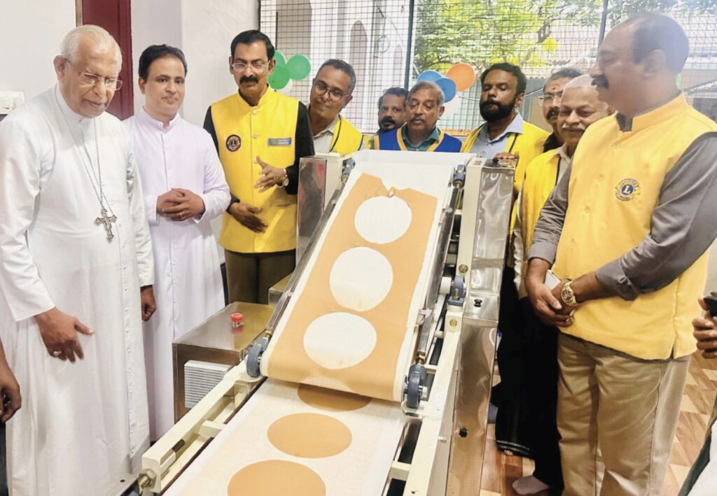 image of The Lions International Organised Chapati Machine Installation as Part of Meals on Wheels of the Lions Reliving Hunger Project Led by Lion District Governor James Valappila, Pmjf.The Lions Club Thrichur Central organised the Manna Cloth Bank Project and also distributed food as part of the Lions Relieving Hunger Project led by Lion District Governor James Valappila.lions club projects
Lions Club Vision Project
Lions Club Cancer Project
Lion club Environment Project
Lions Club Diabetes Project
Lions Relieving Hunger Project
Lions Club Vision Projects
Lions Club Cancer Projects
Lion club Environment Projects
Lions Club Diabetes Projects
Lions Relieving Hunger Projects
Vision Project Lions Club
Cancer Project Lions Club
Environment Project Lion club
Diabetes Project Lions Club
Relieving Hunger Project Lions
Lions Cancer Projects
Lion Environment Projects
Lions Diabetes Projects
Lions Hunger Projects
Vision Project Lions
Cancer Project Lions
Environment Project Lion
Diabetes Project Lions
Hunger Project Lions
Lions Hunger ProjectLion Club Kerala.Featured by www.jamesvalappila.com and authored by Lion James Valappila PMJF